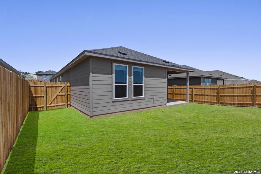 Exterior details and patio area of a home in Juniper Ranch, Spring Branch (Image 3).
