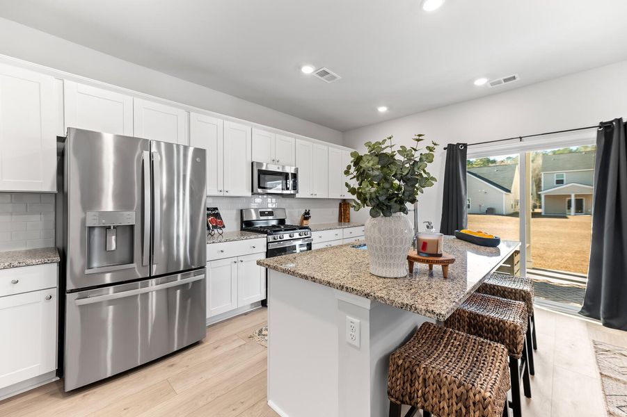 Furnished interior view inside a new home in Heron's Walk at Summers Corner, Summerville (Image 9).
