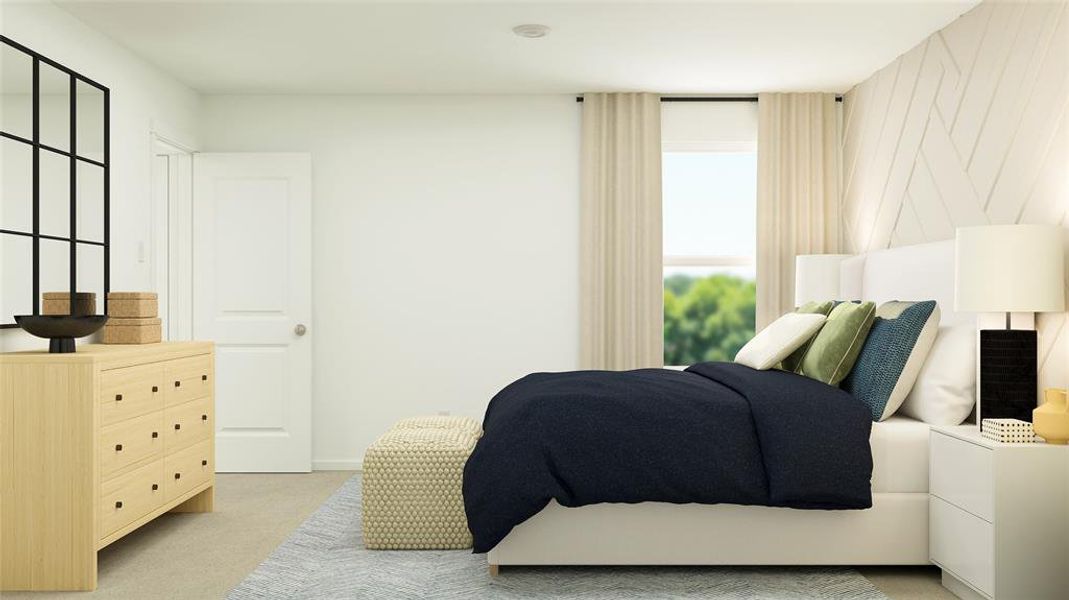 Bedroom with light colored carpet