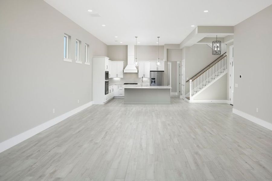 Representative unfurnished interior of a home built from the Grand Mainsail by Minto Communities in Latitude Margaritaville Watersound, Panama City Beach (Image 17).