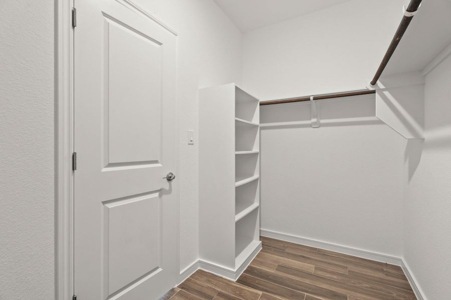 Primary walk-in closet (*Photo not of actual home and used for illustration purposes only.)