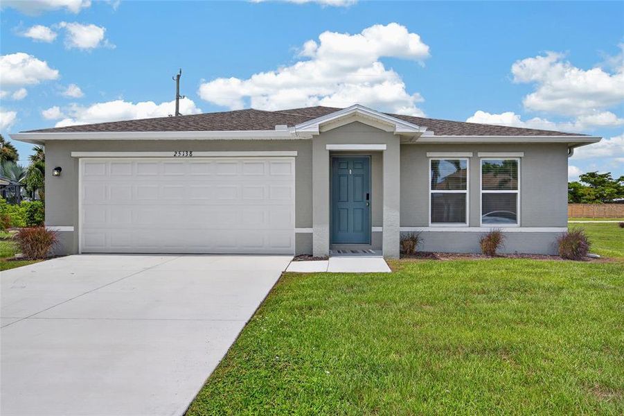 Front exterior of a new home in , Punta Gorda, FL, highlighting curb appeal (Image 1). Front exterior of a new home in , Punta Gorda, FL, highlighting curb appeal (Image 1).