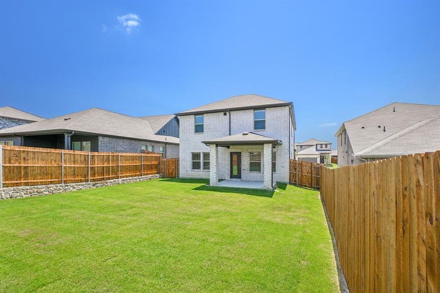 Front exterior of a new home in Simpson Crossing - Spring Series, McKinney, TX, highlighting curb appeal (Image 22).