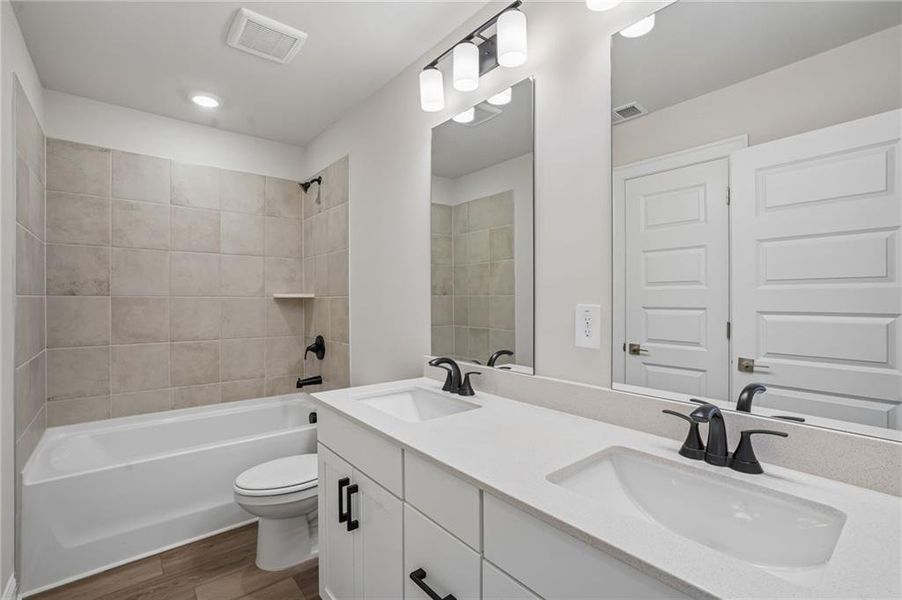 Furnished interior view inside a new home in Hemingway - Highland Series, Cumming (Image 11). Furnished interior view inside a new home in Hemingway - Highland Series, Cumming (Image 11).