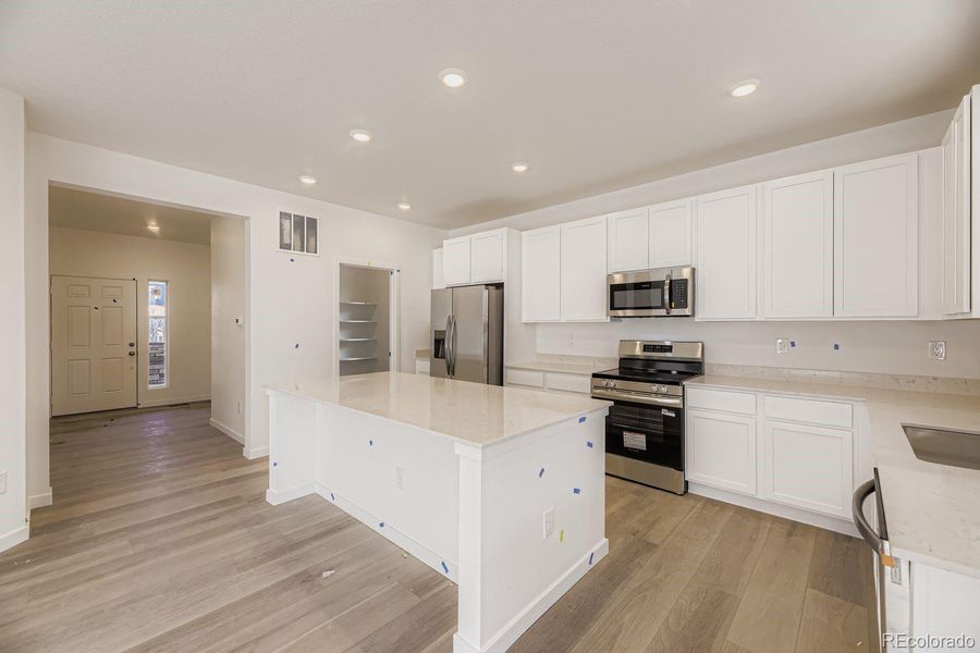 Furnished interior view inside a new home in Ken-Caryl Ranch: The Pioneer Collection, Littleton (Image 5).