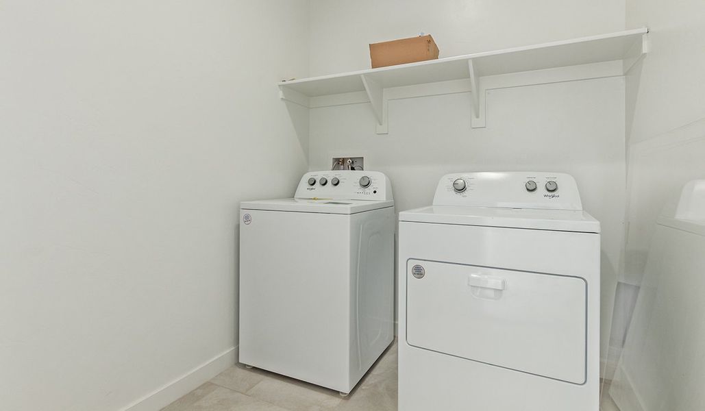 Representative furnished interior of a home built from the Kingston by D.R. Horton in Barnett Village, Marana (Image 40).