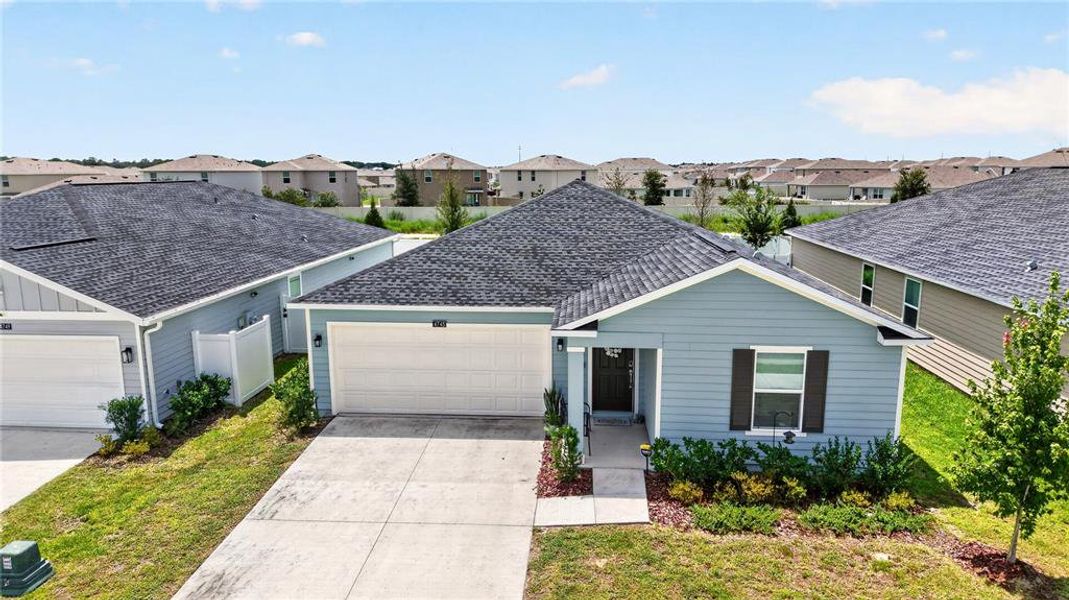 Front exterior of a new home in Marion Ranch, Ocala, FL, highlighting curb appeal (Image 24). Front exterior of a new home in Marion Ranch, Ocala, FL, highlighting curb appeal (Image 24).