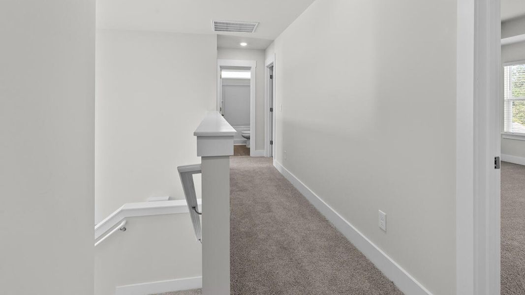 Spacious, unfurnished interior of a new home in Indigo Preserve, Leland (Image 26).