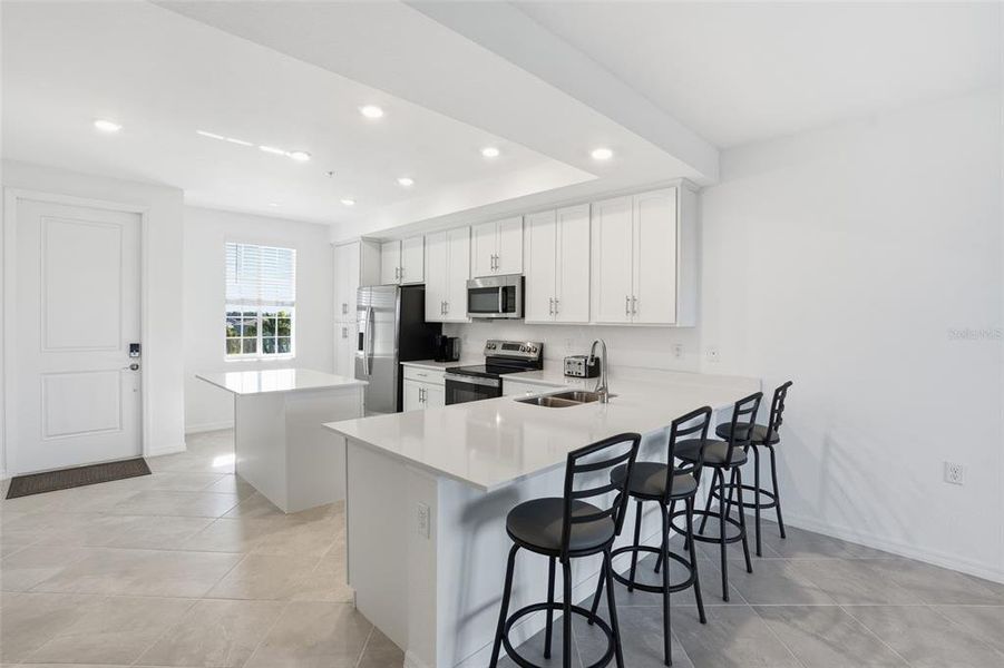 Furnished interior view inside a new home in Heritage Landing, Punta Gorda (Image 11).