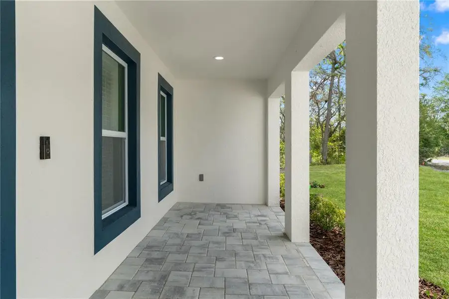 Exterior details and patio area of a home in , Weeki Wachee (Image 29).