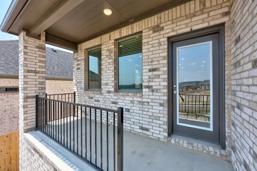 Covered Patio in the Magnolia home plan by Trophy Signature Homes – REPRESENTATIVE PHOTO Covered Patio in the Magnolia home plan by Trophy Signature Homes – REPRESENTATIVE PHOTO