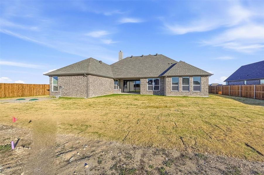 Exterior details and patio area of a home in Coyote Crossing, Godley (Image 3).