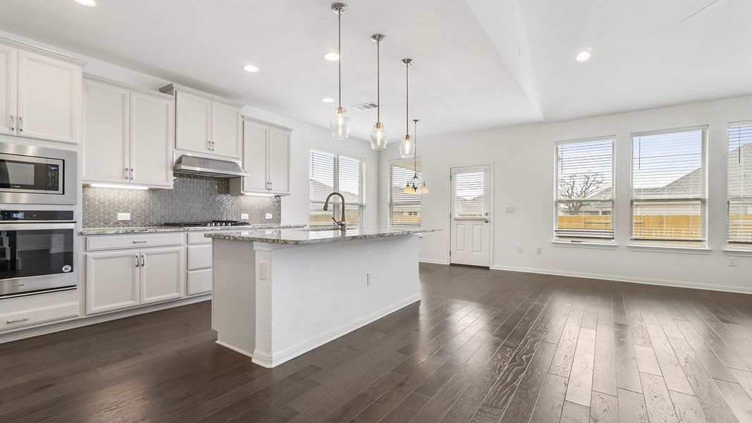 Representative furnished interior of a home built from the Thornton by Ashton Woods in Lagos Reserve, Manor (Image 7). Representative furnished interior of a home built from the Thornton by Ashton Woods in Lagos Reserve, Manor (Image 7).