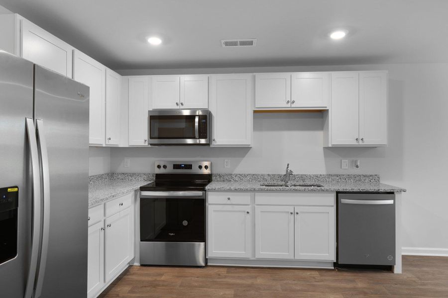 Furnished interior view inside a new home in Center Pointe, Santee (Image 4).