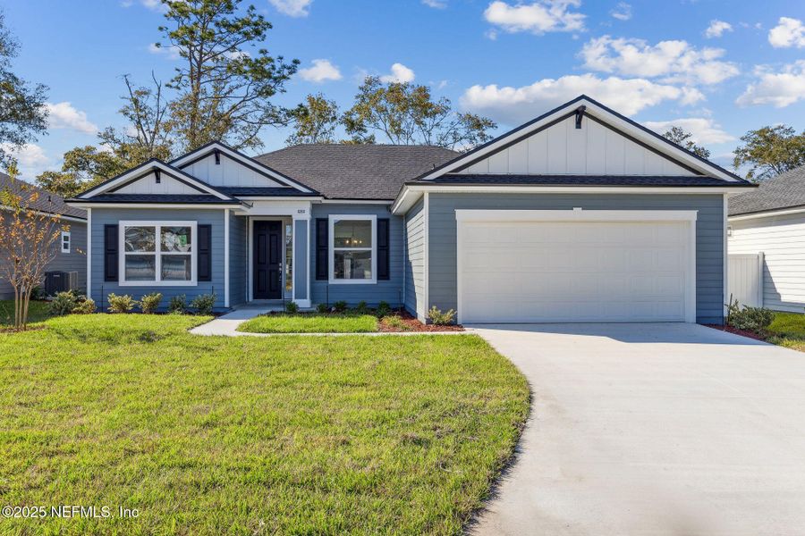 Front exterior of a new home in , Jacksonville, FL, highlighting curb appeal (Image 1). Front exterior of a new home in , Jacksonville, FL, highlighting curb appeal (Image 1).
