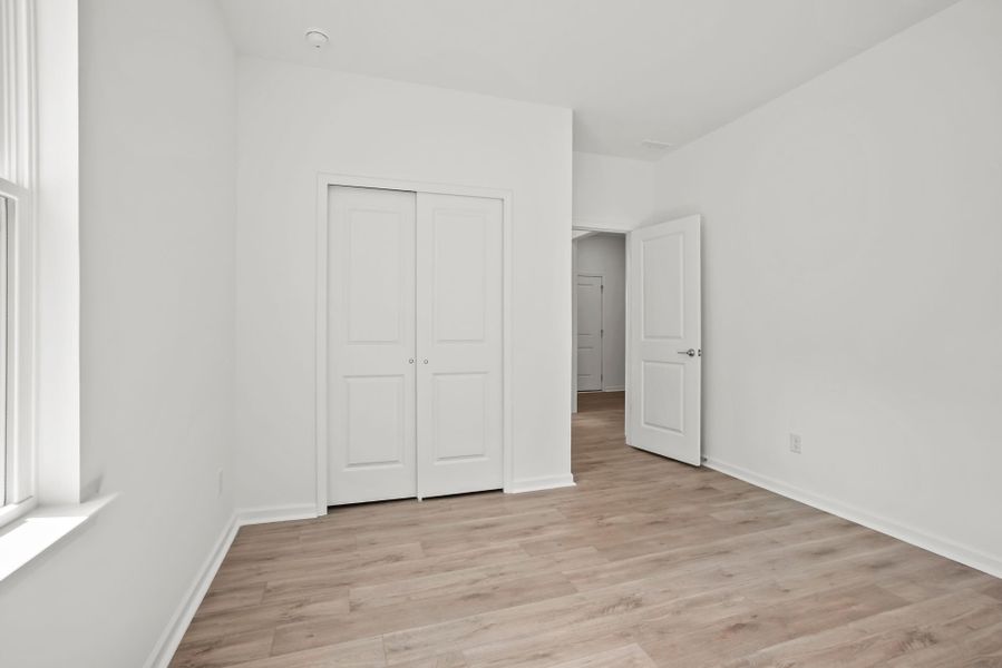 Spacious, unfurnished interior of a new home in Michaux Gardens, Belmont (Image 91).