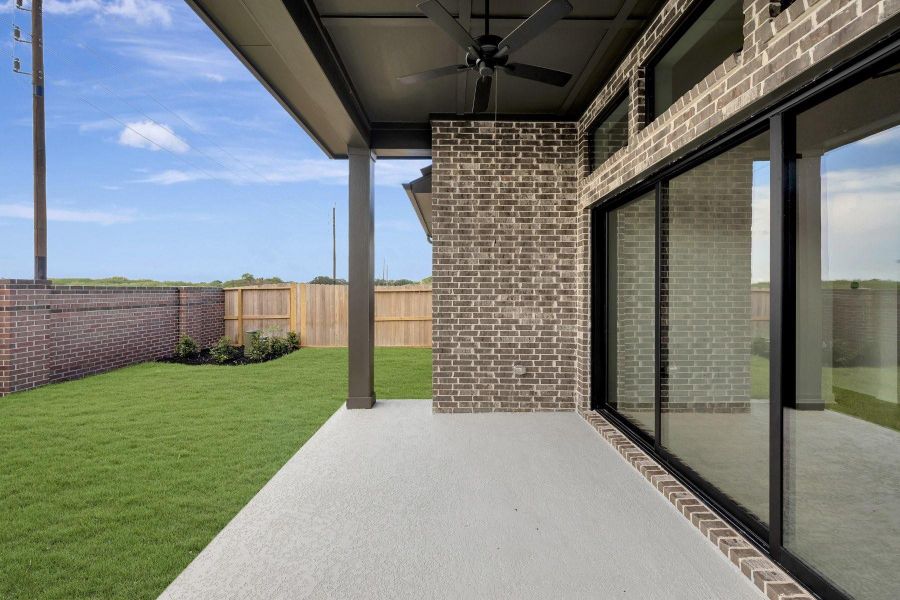 Exterior details and patio area of a home in Sienna - Grove Collection, Missouri City (Image 3).