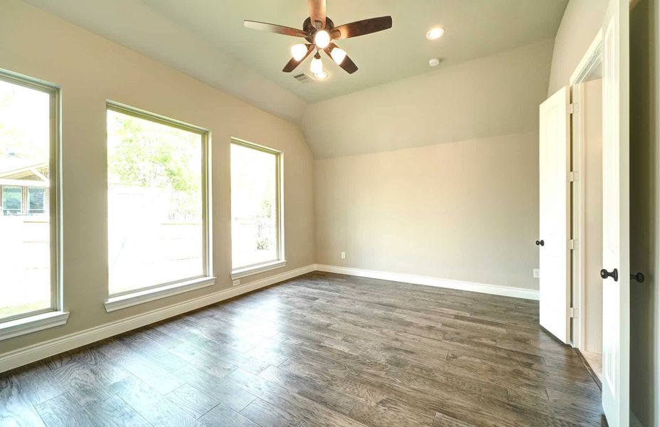 Representative unfurnished interior of a home built from the 3030 by Ravenna Homes in The Woodlands Hills 65′, Willis (Image 37). Representative unfurnished interior of a home built from the 3030 by Ravenna Homes in The Woodlands Hills 65′, Willis (Image 37).