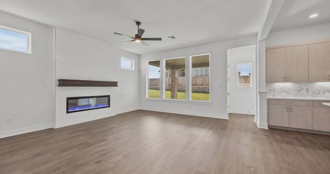 Representative unfurnished interior of a home built from the Courtney by Chesmar Homes in Sunfield, Buda (Image 5). Representative unfurnished interior of a home built from the Courtney by Chesmar Homes in Sunfield, Buda (Image 5).