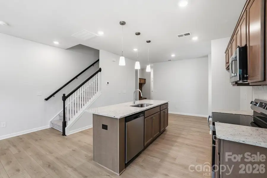 Furnished interior view inside a new home in Sloan Station, Charlotte (Image 11).