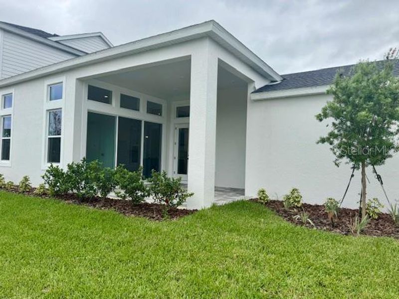Exterior details and patio area of a home in Persimmon Park, Wesley Chapel (Image 2). Exterior details and patio area of a home in Persimmon Park, Wesley Chapel (Image 2).