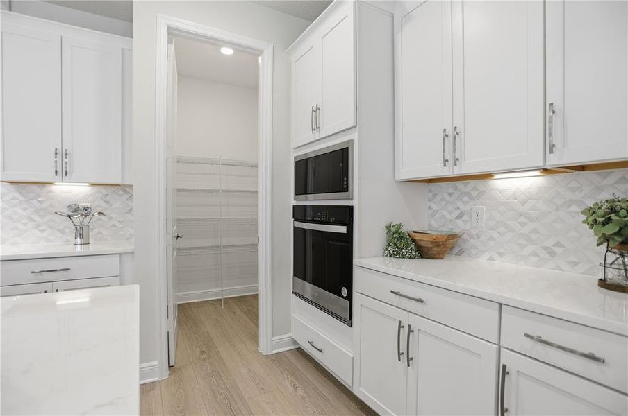Furnished interior view inside a new home in Acuera Estates, Apopka (Image 16). Furnished interior view inside a new home in Acuera Estates, Apopka (Image 16).