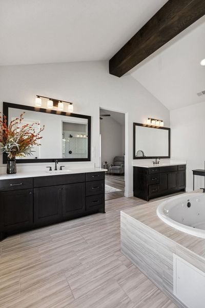 Beamed ceiling primary bathroom