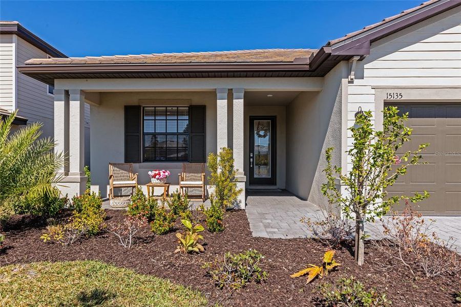 Exterior details and patio area of a home in Lorraine Lakes at Lakewood Ranch, Lakewood Ranch (Image 3).