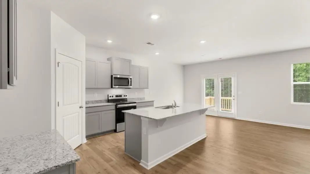 Furnished interior view inside a new home in Oaks at Cedar Grove, Fairburn (Image 7).