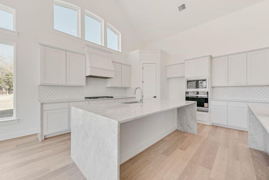 Furnished interior view inside a new home in Heath Golf & Yacht Club, Heath (Image 12).