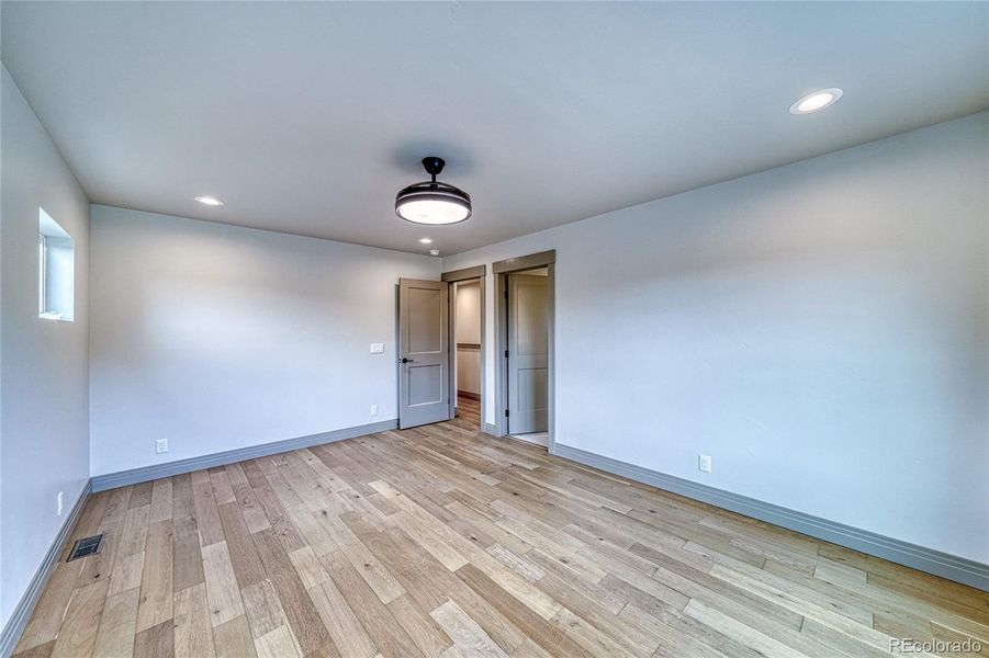 Bedroom #3.is the primary bedroom with en suite.  This light is also a ceiling fan with blades that come out.