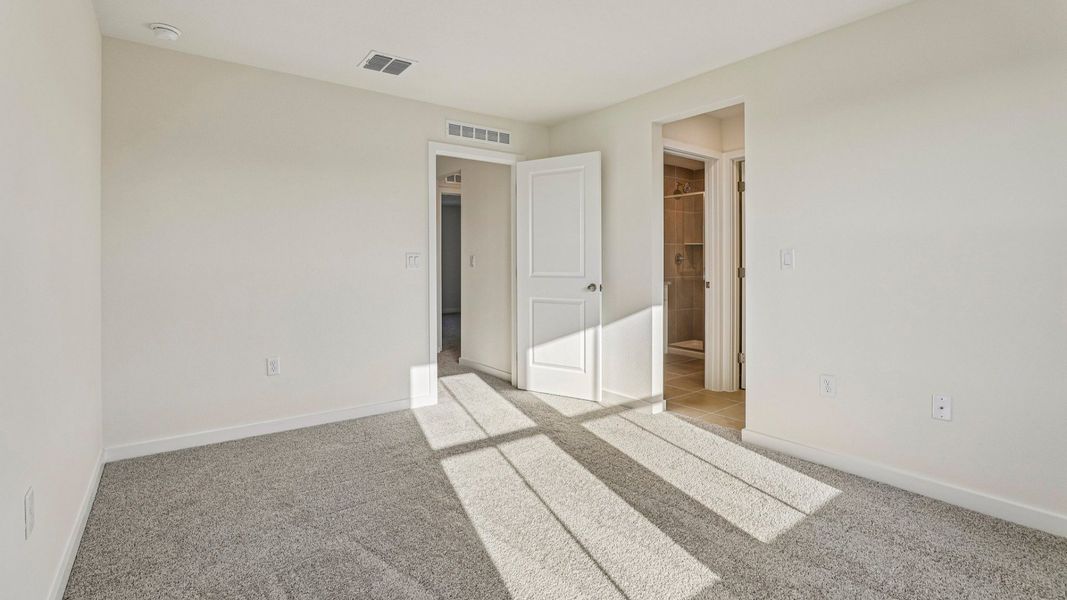Furnished interior view inside a new home in Cyrene at Harmony, St. Cloud (Image 23).