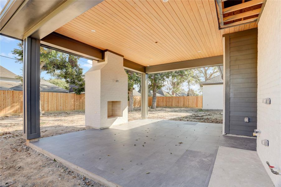 Imagine the evenings here with your crackling wood burning fire. The covered outdoor veranda is also equipped with sink and premium outdoor grill and powder bath. Imagine the evenings here with your crackling wood burning fire. The covered outdoor veranda is also equipped with sink and premium outdoor grill and powder bath.