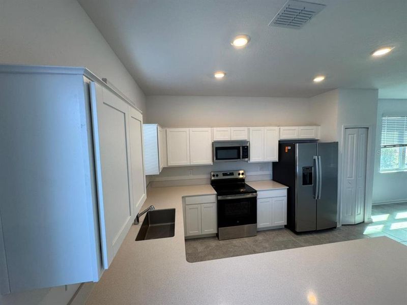 Furnished interior view inside a new home in , Davenport (Image 3).