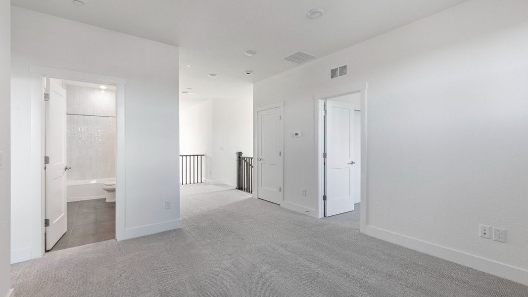Furnished interior view inside a new home in Dillon Pointe - Journey, Broomfield (Image 24).