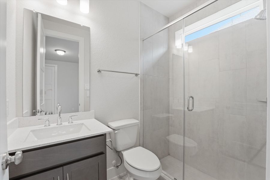 Furnished interior view inside a new home in Bridgeland, Cypress (Image 9).