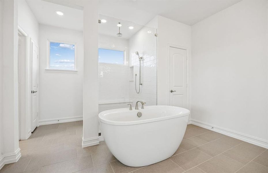 Owners bathroom with separate stand alone tub Owners bathroom with separate stand alone tub