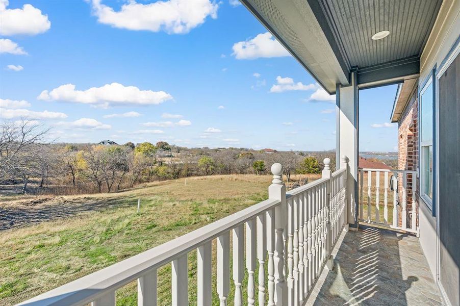 Balcony featuring a rural view on second floor Balcony featuring a rural view on second floor