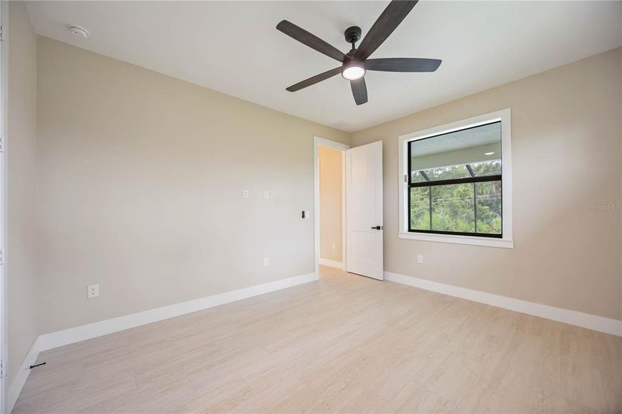 Spacious, unfurnished interior of a new home in , Port Charlotte (Image 28).