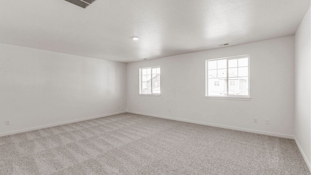 Representative unfurnished interior of a home built from the Elm by D.R. Horton in Granary, Johnstown (Image 11).
