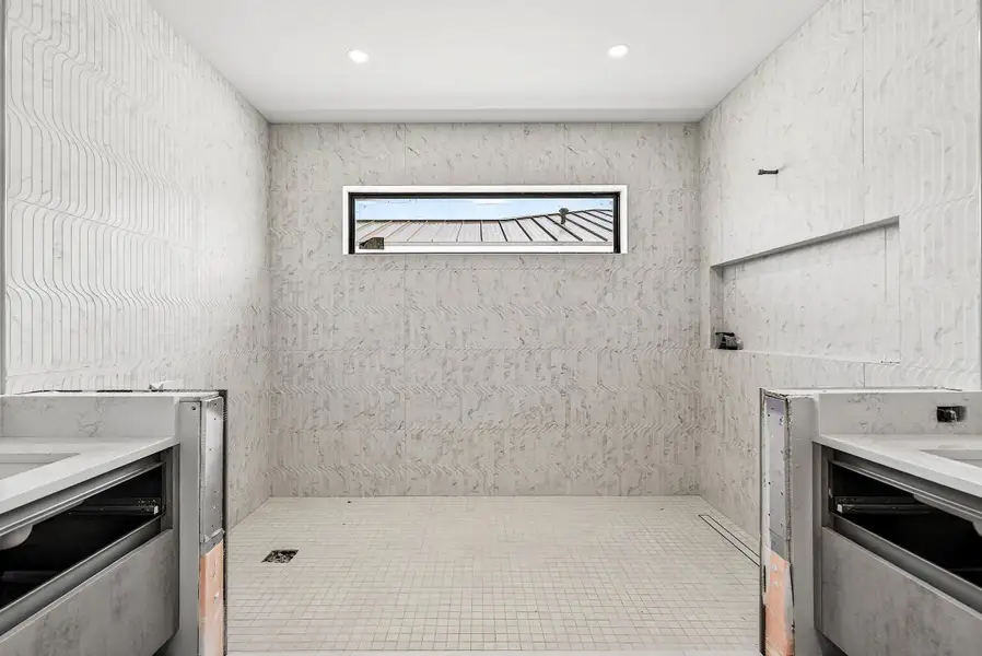 Primary bathroom with dual vanities; walk in shower Primary bathroom with dual vanities; walk in shower