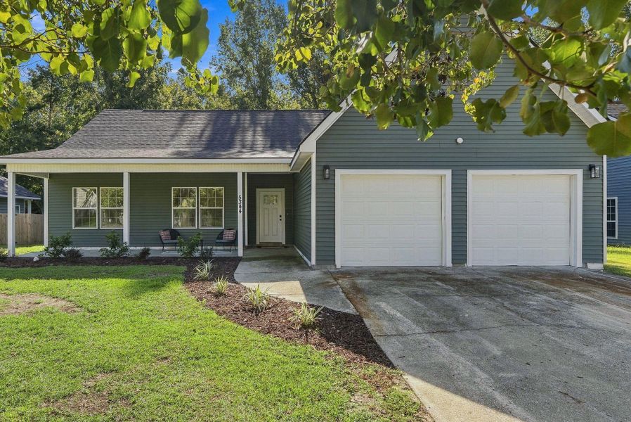 Front exterior of a new home in , North Charleston, SC, highlighting curb appeal (Image 1). Front exterior of a new home in , North Charleston, SC, highlighting curb appeal (Image 1).