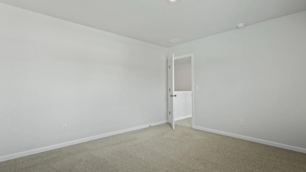 Spacious, unfurnished interior of a new home in Pine Hills at Cane Bay, Summerville (Image 13).