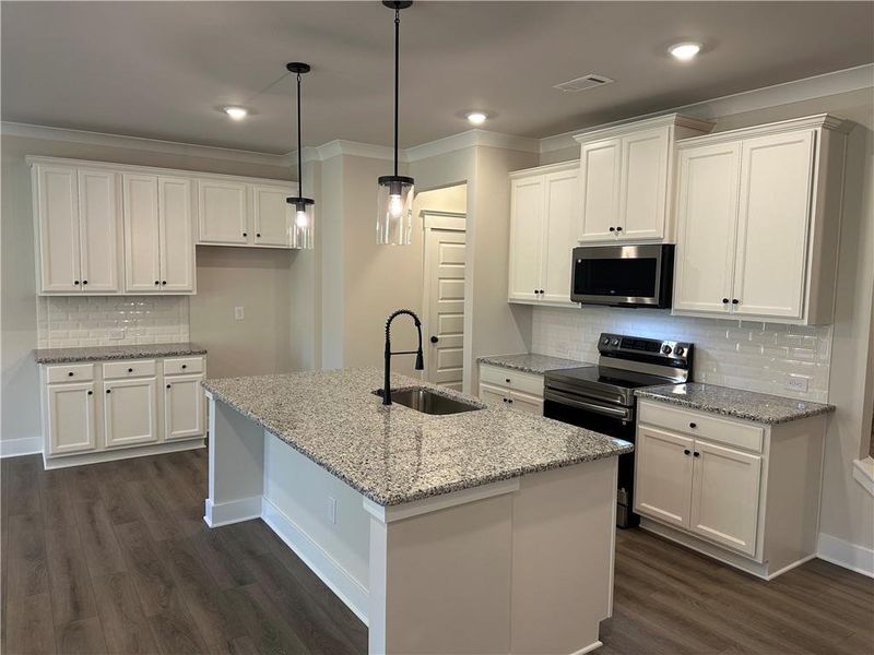 Furnished interior view inside a new home in Millstone at Mundy Mill, Gainesville (Image 6). Furnished interior view inside a new home in Millstone at Mundy Mill, Gainesville (Image 6).