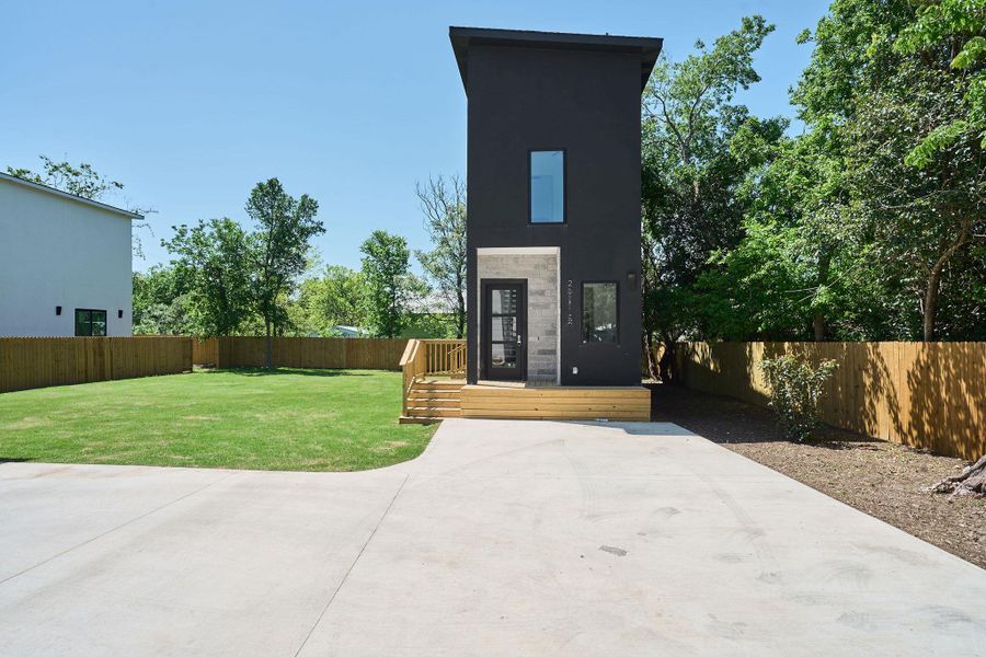 Front exterior of a new home in , Austin, TX, highlighting curb appeal (Image 1).