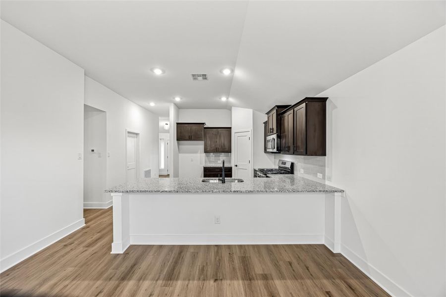 Furnished interior view inside a new home in River Ranch Trails, Dayton (Image 5).