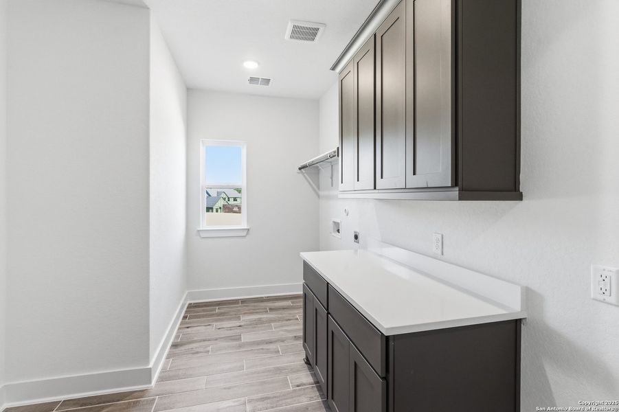 Furnished interior view inside a new home in Caliza Reserve, Boerne (Image 7).