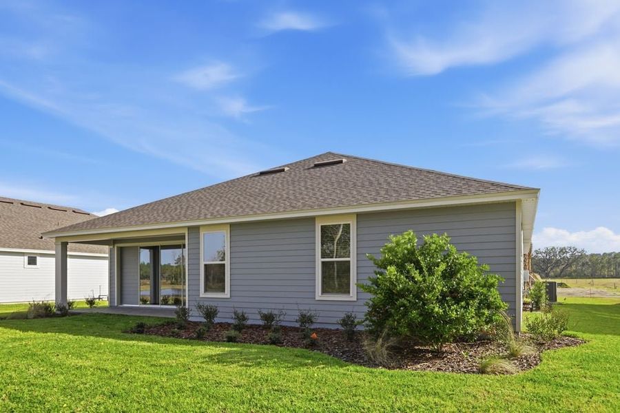 Exterior details and patio area of a home in Headwaters at Lofton Creek, Yulee (Image 4).