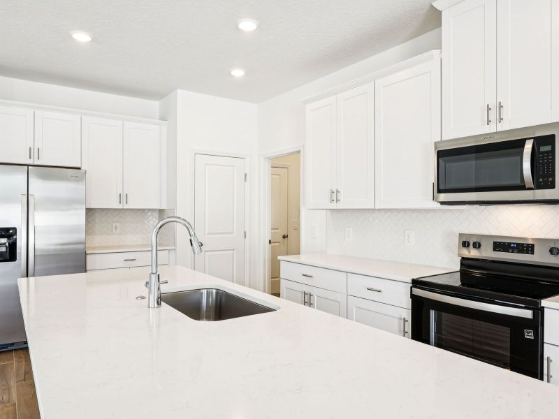 Furnished interior view inside a new home in Cyrene at Minneola - Villas, Minneola (Image 4). Furnished interior view inside a new home in Cyrene at Minneola - Villas, Minneola (Image 4).