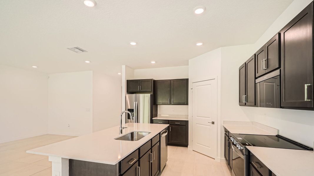 Representative furnished interior of a home built from the Delray by D.R. Horton in Twin Oaks, Stuart (Image 6).